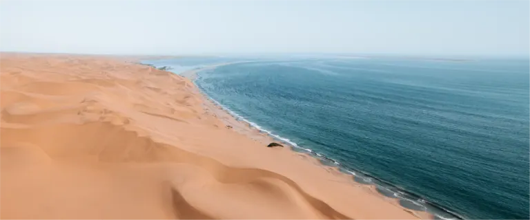 The meeting of Namibian desert dunes and the Atlantic Ocean